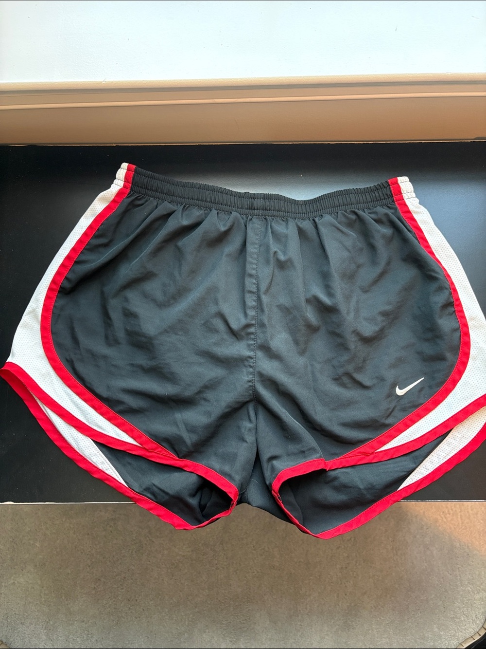 Nike Black Athletic Shorts with Red & White Accents
